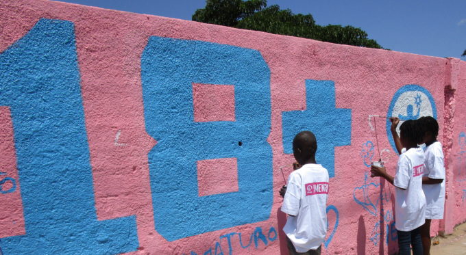 Kids paint 18+ on the wall