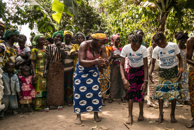 women dancing in forest guinea