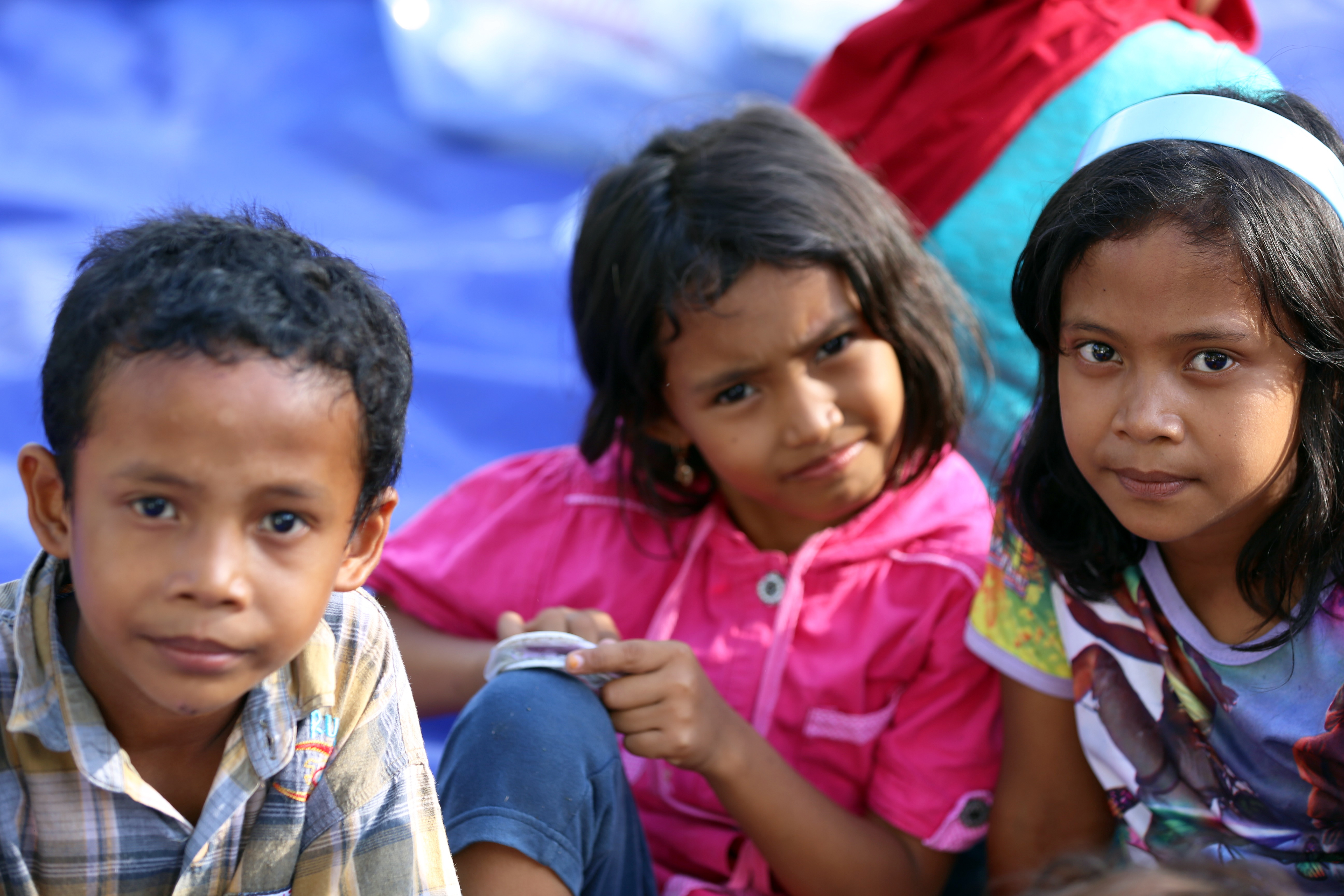 Girls at mobile recreation centre set up by Plan International i